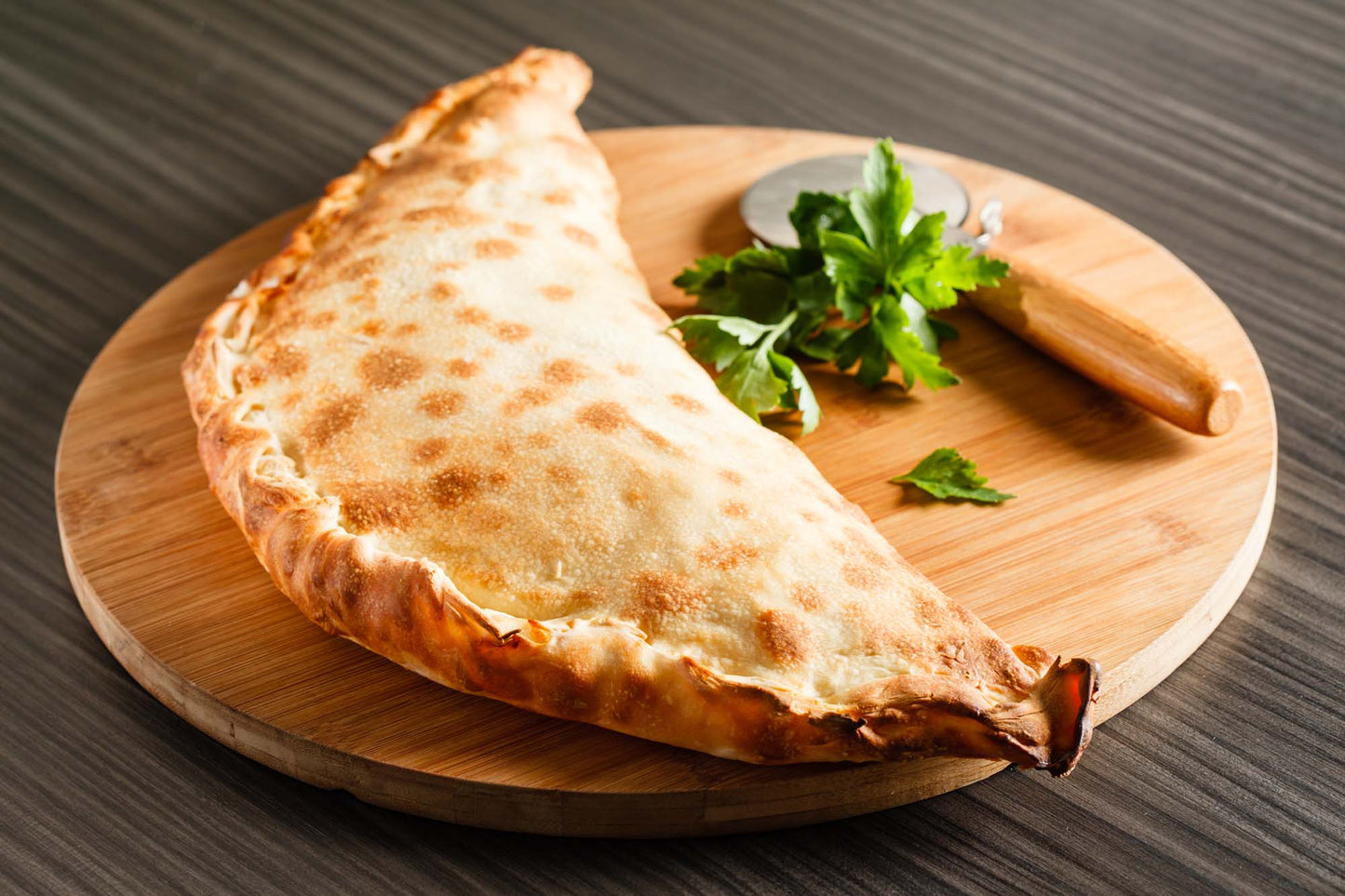 29. CALZONE 1 Tomat, ost, skinke.